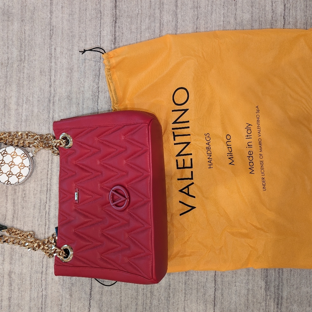 Red quilted Valentino shoulder bag with gold and green strap and change purse
